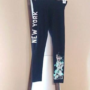 Never worn size 10 Justice NY Leggings